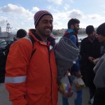 20151217 around 10AM refugees are blissful happy to receive our foods and flyers at Pireaus harbor in Athens Greece (28)