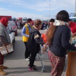 20151217 around 10AM refugees are blissful happy to receive our foods and flyers at Pireaus harbor in Athens Greece (32)