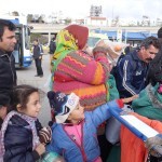 20151217 around 10AM refugees are blissful happy to receive our foods and flyers at Pireaus harbor in Athens Greece (43)