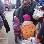 20151217 around 10AM refugees are blissful happy to receive our foods and flyers at Pireaus harbor in Athens Greece (52)