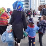 20151217 around 10AM refugees are blissful happy to receive our foods and flyers at Pireaus harbor in Athens Greece (54)