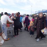 20151217 around 10AM refugees are blissful happy to receive our foods and flyers at Pireaus harbor in Athens Greece (56)