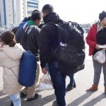 20151217 around 10AM refugees are blissful happy to receive our foods and flyers at Pireaus harbor in Athens Greece (67)