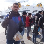 20151217 around 10AM refugees are blissful happy to receive our foods and flyers at Pireaus harbor in Athens Greece (73)