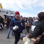 20151217 around 10AM refugees are blissful happy to receive our foods and flyers at Pireaus harbor in Athens Greece (79)