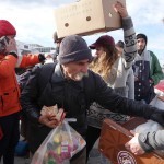 20151217 around 10AM refugees are blissful happy to receive our foods and flyers at Pireaus harbor in Athens Greece (84)