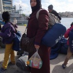 20151217 around 10AM refugees are blissful happy to receive our foods and flyers at Pireaus harbor in Athens Greece (90)