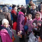 20151217 around 10AM refugees are blissful happy to receive our foods and flyers at Pireaus harbor in Athens Greece (91)