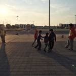 Playing soccer with children