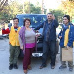 Mr Michael Aivaliotis with the new van for the 'Village of All-together' pictured with our Association members.