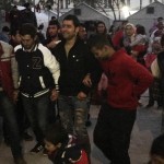 Refugees dancing to their music (5)