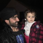 Refugees, father and a child