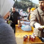 Distributing Bananas and Chocolates at Samos Island, Greece