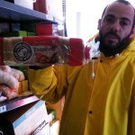 Petros from Platanos Kitchen Showing the Bread for Sandwiches