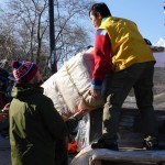 Unloading relief items at Platanos rescue point - with many helpers