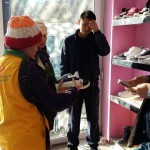 Buying shoes for refugees