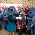 Distributing store vouchers to families