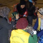 Distributing vegan food packages at the port, Athens, Greece - Feb. 11, 2016