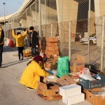 Distributing vegan food packs at the port, Athens, Greece