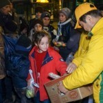 Distributing vegan food packages at the port, Athens, Greece - Feb. 10, 2016