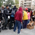Distributing vegan food packages at Victoria square, Athens, Greece - Feb. 10, 2016