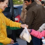Distributing vegan food packs at the port, Athens, Greece