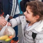 Providing vegan food packages to the refugees at Piraeus Port in Athens, Greece
