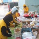 Preparing vegan food packages for refugees, Athens, Greece