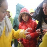 Distributing peanuts and raisins, Indomeni, Greece