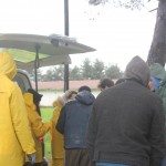 Distributing rain boots at Idomeni camp at Idomeni, Greece