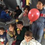 Happy kids with balloons, Idomeni, Greece