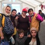 Medical team with happy patients, Idomeni, Greece