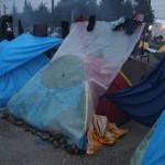 Idomeni , Greece - Because of heavy rain they made plastic cover on tent