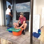 Lukas volunteer chopping potatoes, Chios Island, Greece