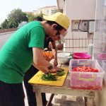 Preparation of the salad at the The People’s Street Kitchen, Chios Island, Greece