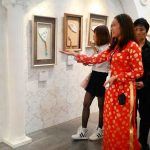 150401-Aulacese Interpreters Introducing Supreme Master Ching Hai’s Art (5)